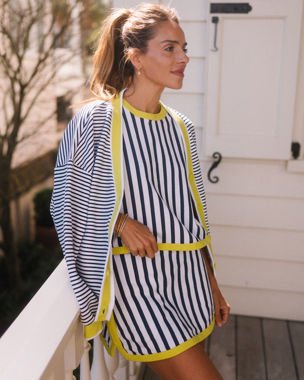 Model is wearing the Lennon Top in Palm Gingham and the Lennon Pants in palm gingham.