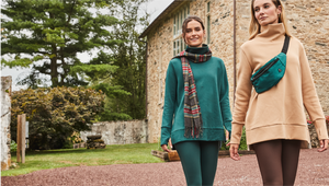Model left is wearing the Rittenhouse Pullover in Ivy with the Everyday Leggings in Ivy. Model right is wearing the Rittenhouse Pullover in Heather Latte with the Everyday Leggings in Chocolate. 