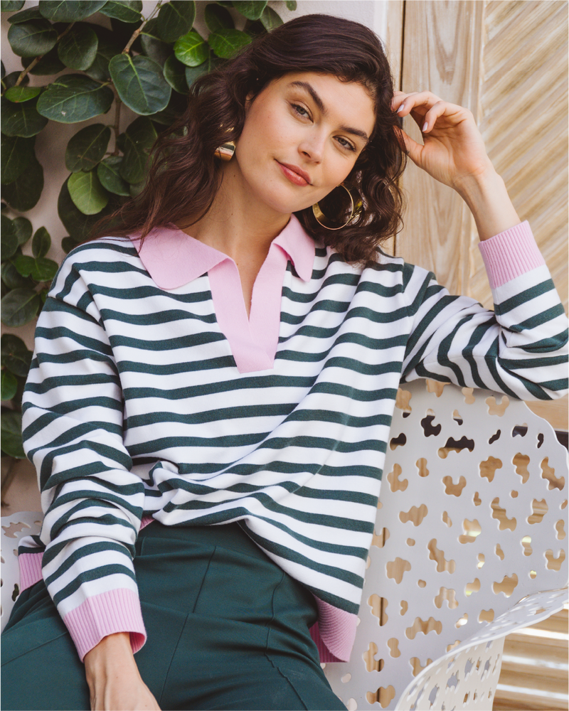 Model is wearing the Lauderdale Sweater in Super White/ Ivy Stripe with the Waverly Pant in Ivy