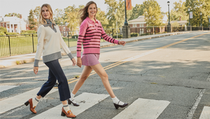 Model (left) is wearing the carlyle rugby sweater in rose/lacque stripe, paired with the flounce skirt in rose/lacquer triple stripe. Model (right) is wearing the carlyle rugby sweater in cream paired with the waverly pant in navy. 