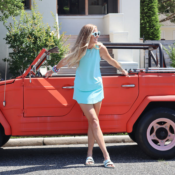 Model is wearing the sport light everyday skort in mint paired with the active mesh everyday tank in mint. 