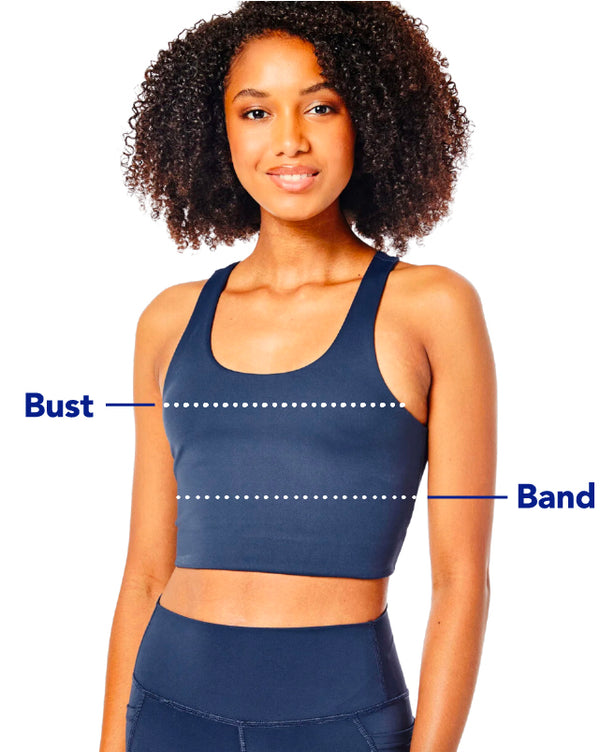 Model is wearing the arch bra in navy with the pattison leggings in navy. Measurement points at bust and band.
