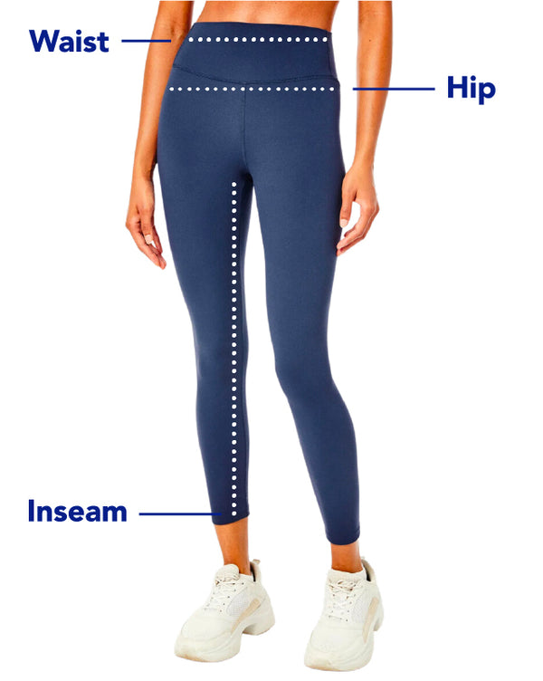 Model is wearing AB soft leggings in navy. Measurement points at waist, hips & inseam.