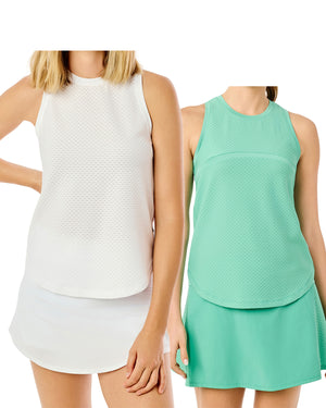 Model on the left is wearing the everyday tank in super white paired with the everyday skort in super white. Model on the right is wearing seamed everyday tank in sage paired with duo flounce skort in sage.