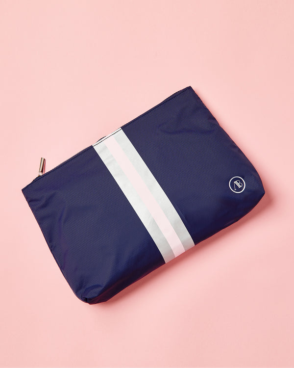 'On model product image of AB Pouch in navy/silver/pink'
