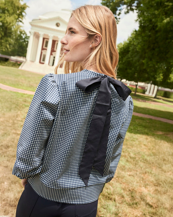 'On model product image of Ponte Beta Bow Pullover Sweatshirt in Navy Gingham'