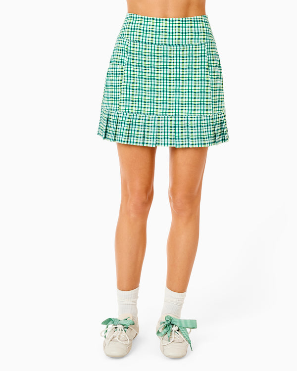 'On model product image of Sport Light 17in Birdie Golf Skort in Sprout Gingham'