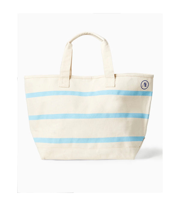 'On model product image of Canvas Stripe Tote in Natural/Light Blue'