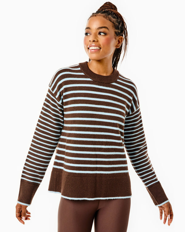 'On model product image of Knit Carlyle Crewneck Sweater in Chocolate/Baby Blue Stripe'