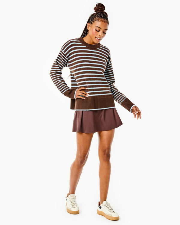 'On model product image of Knit Carlyle Crewneck Sweater in Chocolate/Baby Blue Stripe'