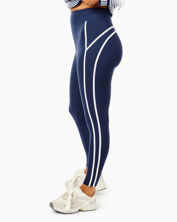'On model product image of Luxe Sport High-Rise Chestnut Legging in Navy'