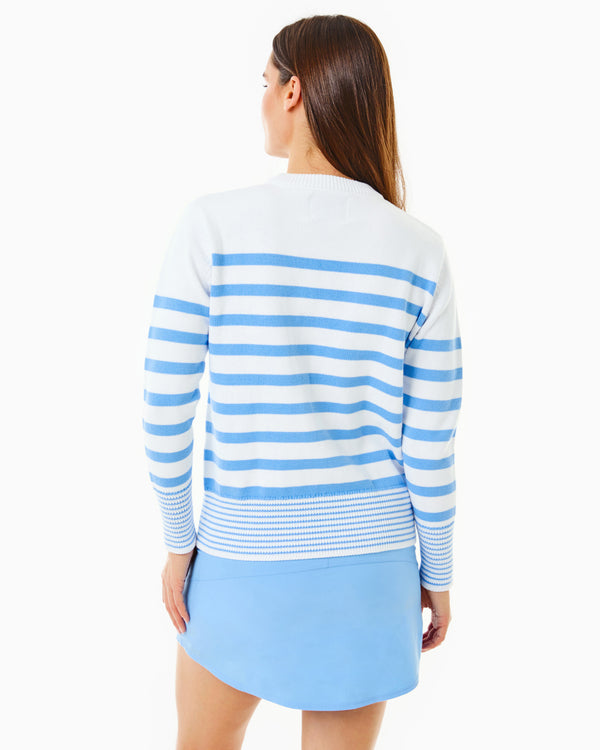Model is wearing the Coastal Crewneck in Super White/Matisse Stripe with the Everyday Skort in Matisse