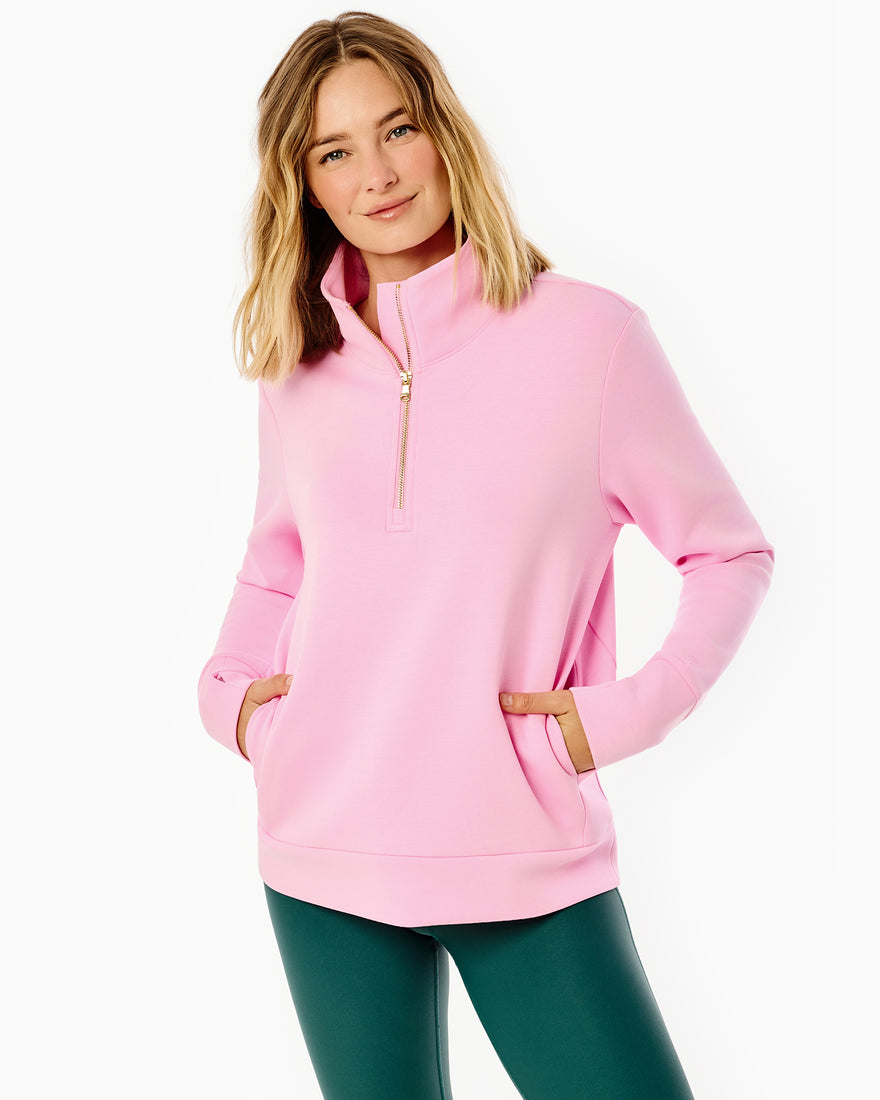 Model is wearing the everyday quarter zip in lavender paired with the spruce leggings in navy/super white/violet/lavender. 