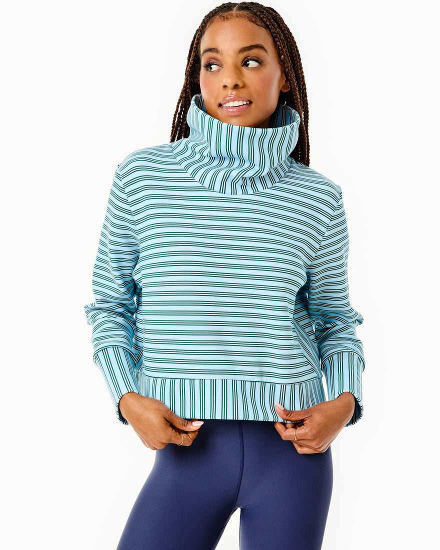 Model is wearing the Everyother Day Pullover in navy and white stripe with the Everyday Legging in beverly blue.