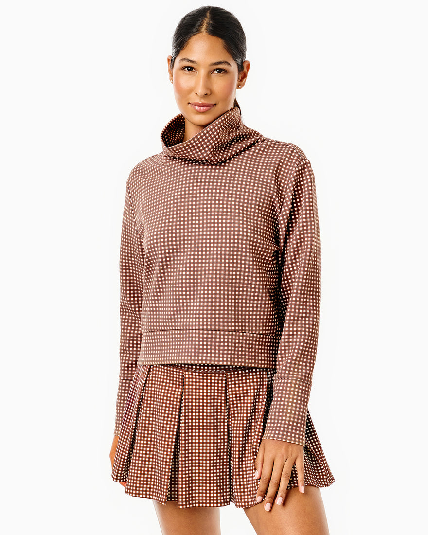 Model is wearing the Everyother Day Pullover in navy and white stripe with the Everyday Legging in beverly blue.