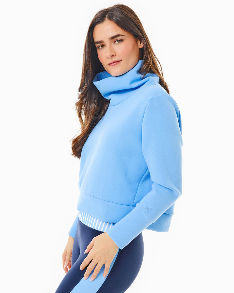 Model is wearing the Everyother Day Pullover in Matisse with the Hudson Legging in Navy/Matisse