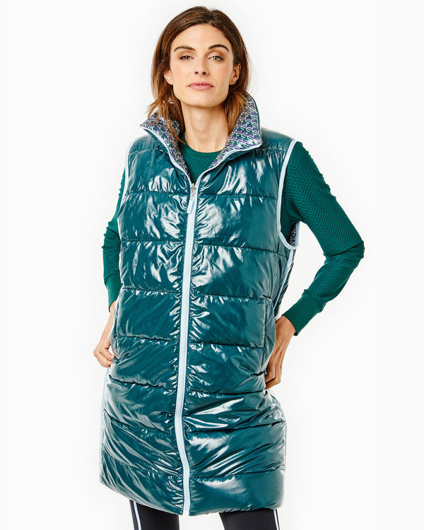'On model product image of Everywhere Reversible Puffer Vest in Stars Ivy'