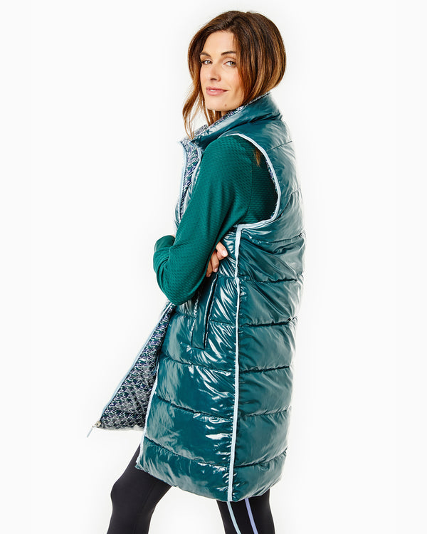 Model is wearing the Everywhere Reversible Puffer Vest in Stars Ivy with the Palmetto Long Sleeve in Ivy and the Chestnut Legging in Black