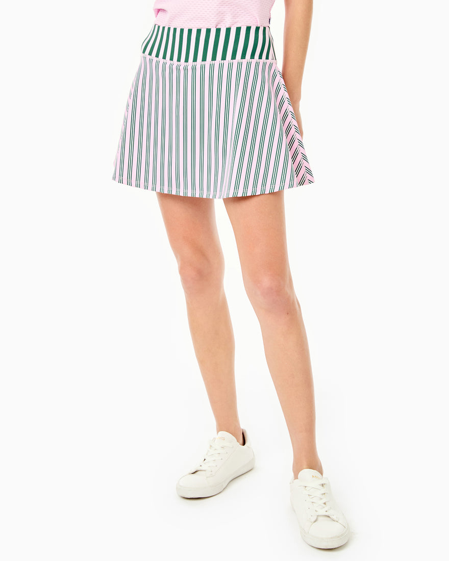 Model is wearing the Flounce Skort in peony with the Classic Short Sleeve in peony stripe.