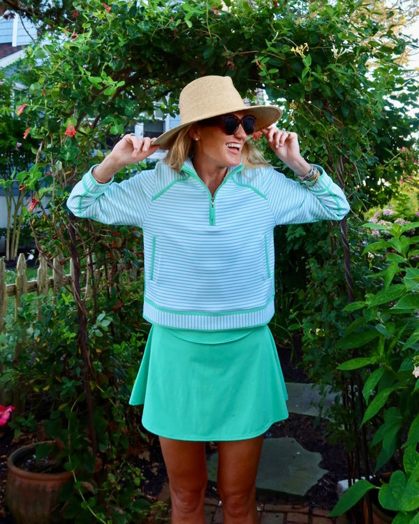 'On model product image of Smooth Sport 14in Flounce Skort in Sage'