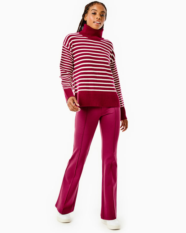 Model is waring the Kitt Sweater x Mary Orton in Burgundy/ Off White Stripe with the Nico Pants x Mary Orton in Burgundy