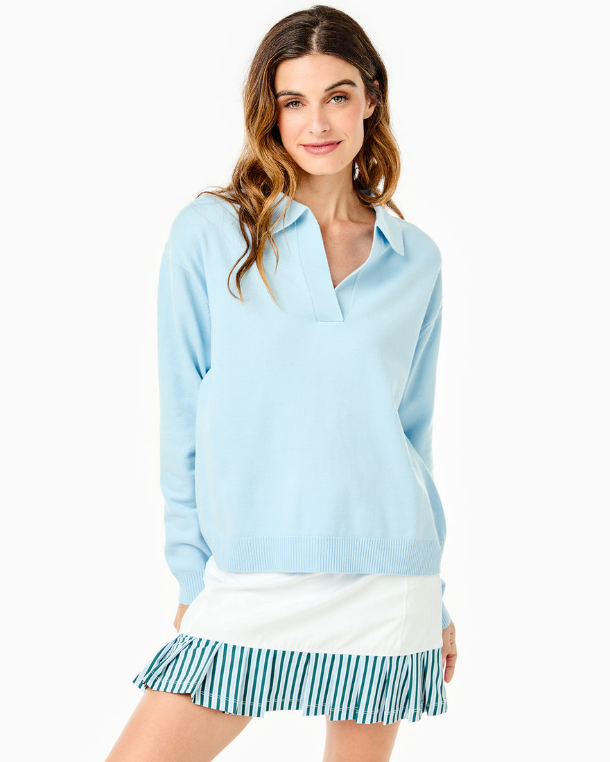 Model is wearing the Lauderdale Sweater in Baby Blue with the Court Skort in Super White/Baby Blue/Ivy Stripe