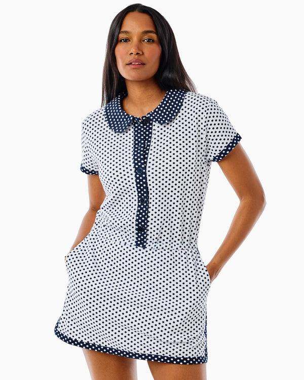 'On model product image of Active Pique Lennon Romper in Super White/Navy Dottie'