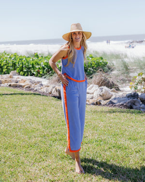 Marghi is wearing the Lennon Top in Violet/Papaya with the Lennon Pants in Violet/Papaya