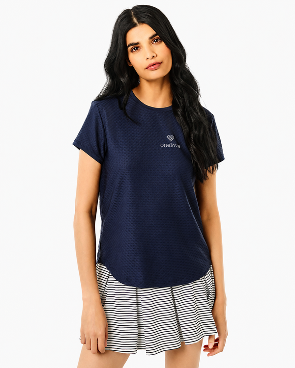 'On model product image of One Love Active Mesh Palmetto Short Sleeve Top in Navy'