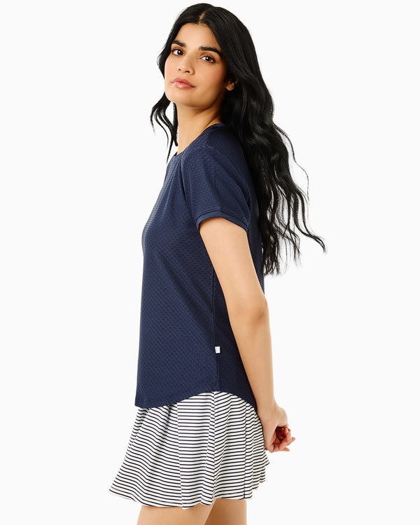 'On model product image of One Love Active Mesh Palmetto Short Sleeve Top in Navy'