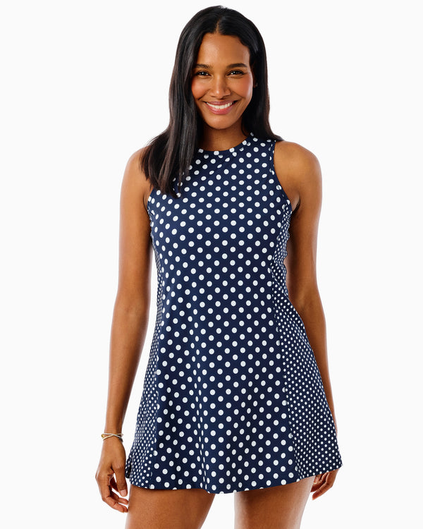 'On model product image of Smooth Sport Sleeveless Panama Active Dress in Navy Dottie'