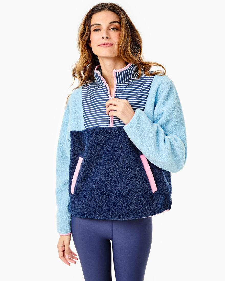 Model is wearing the Reed Sherpa in Baby Blue/Navy Stripe with the Everyday Legging in Navy/Light Blue/Petal