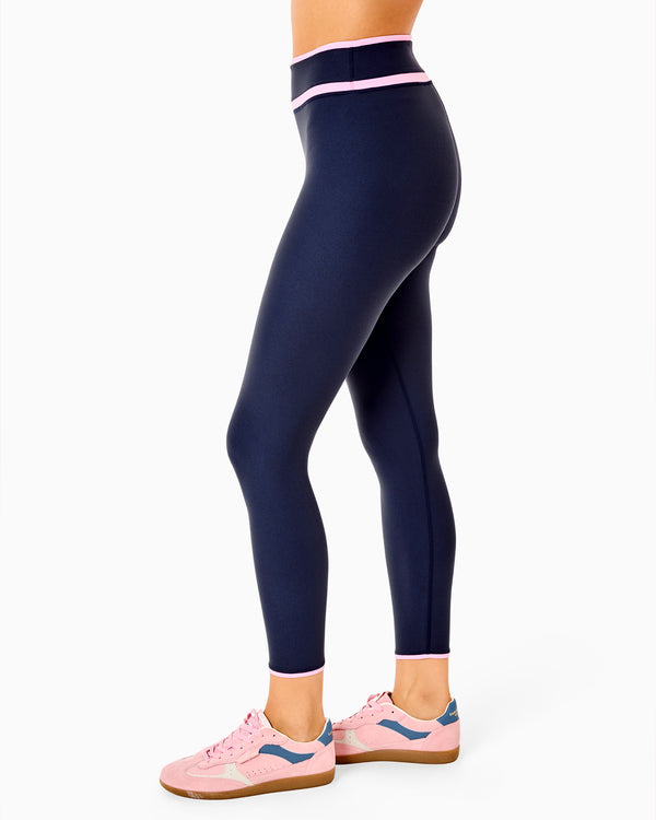 'On model product image of Seamed AB Soft Legging in Navy/Cotton Candy'