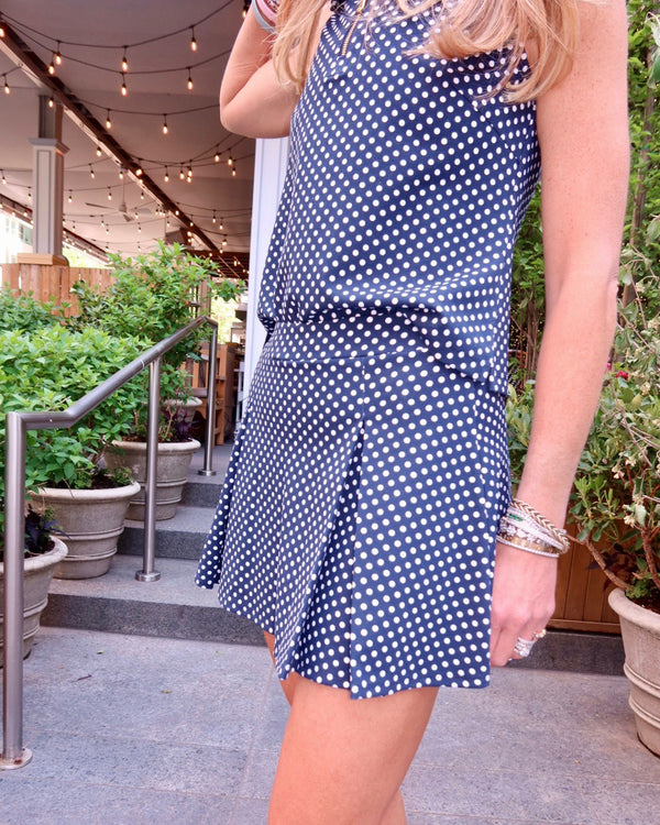 'On model product image of Ponte Virginian Pleated 14.25in Skort in Navy Dottie'