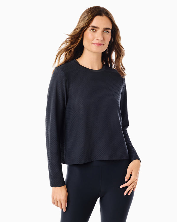 'On model product image of Active Mesh Walnut Long Sleeve Top in Black'