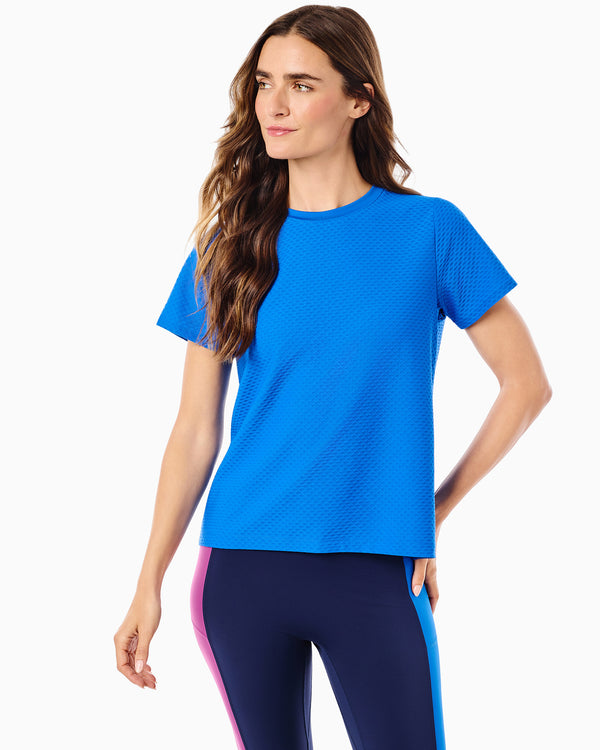 'On model product image of Active Mesh Walnut Short Sleeve Top in Harbor Blue'