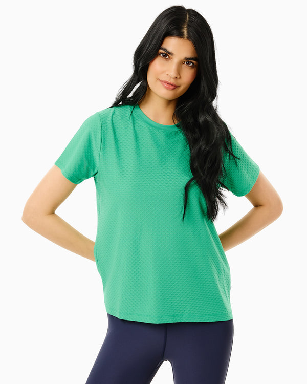 'On model product image of Active Mesh Walnut Short Sleeve Top in Palm'