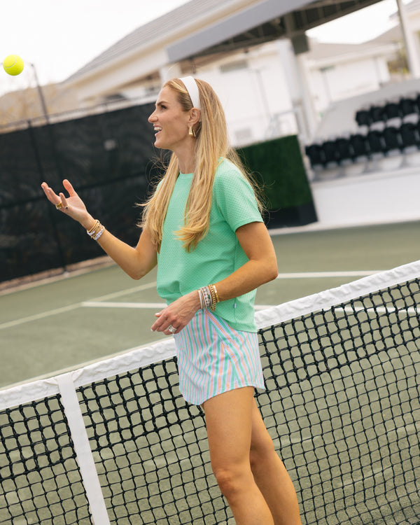 'On model product image of Active Mesh Walnut Short Sleeve in Sage'