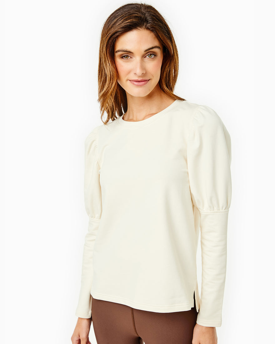 Model is wearing the Webster Top in Cream with the Everyday Leggings in Chocolate