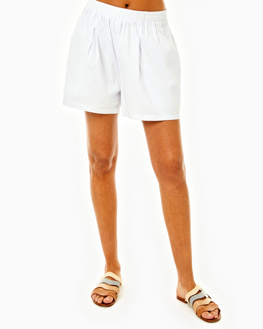 Model is wearing the Wharf Shorts in white/navy stripes with the Wharf Top in white/navy double stripes