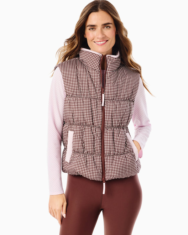 'On model product image of Puffer Whitfield Vest in Milk Chocolate Gingham'