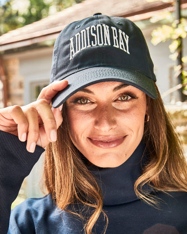 'On model product image of Addison Bay Embroidered Hat in Navy'