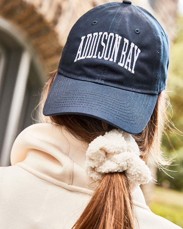 'On model product image of Addison Bay Embroidered Hat in Navy'