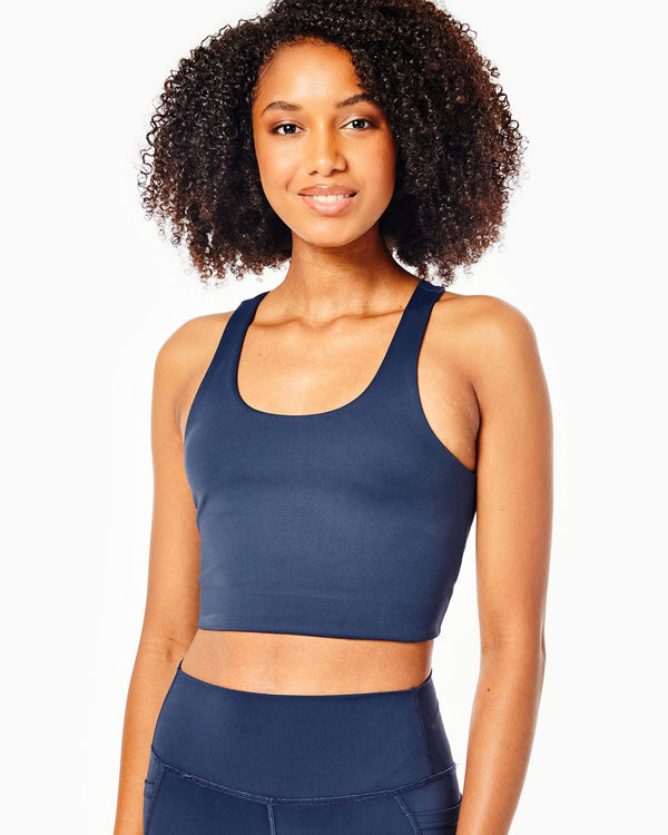 'On model product image of Smooth Sport Arch Bra in Navy'