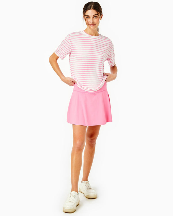 'On model product image of Smooth Sport 14in Flounce Skort in Peony'