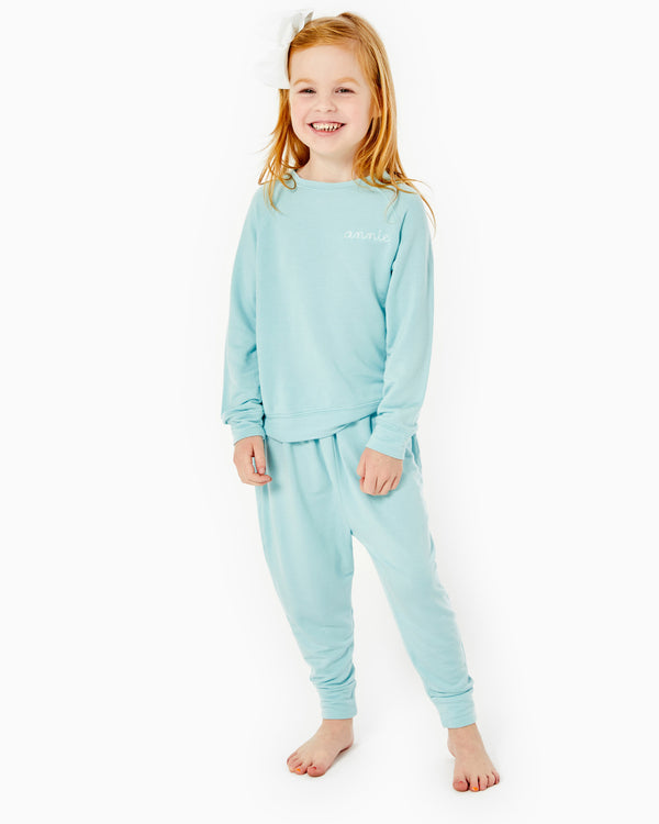 'On model product image of Kids Lovie Sweatpant in Light Blue'