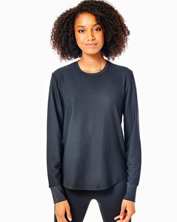 'On model product image of Active Mesh Palmetto Long Sleeve Top in Black'