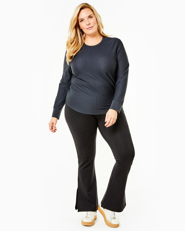 'On model product image of Active Mesh Palmetto Long Sleeve Top in Black'