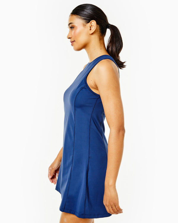 Model is wearing the Panama Dress in Navy