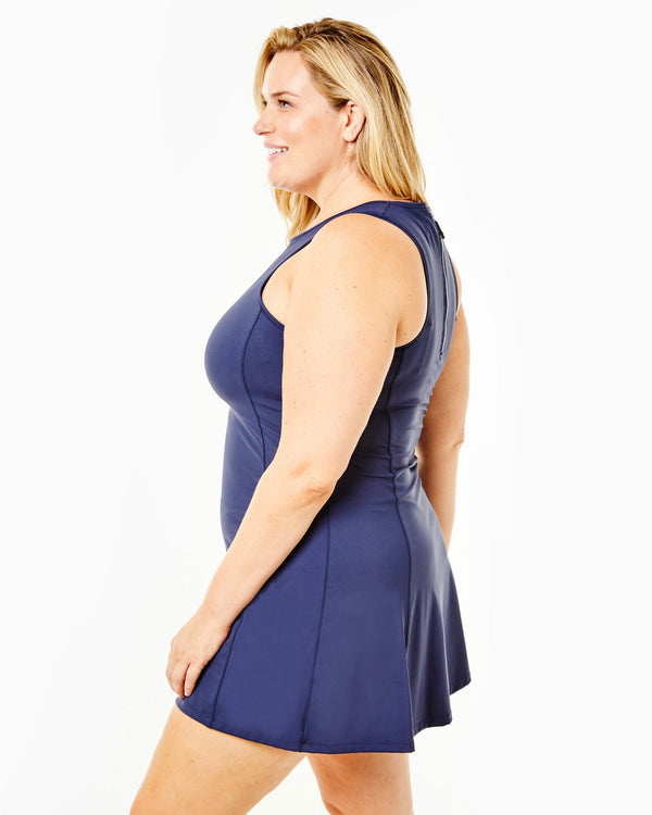 Model is wearing the Panama Dress in Navy